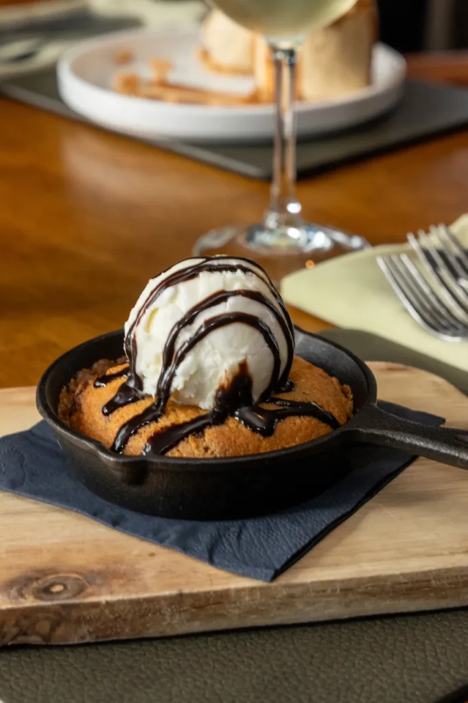 Skillet cookie with ice cream and chocolate sauce