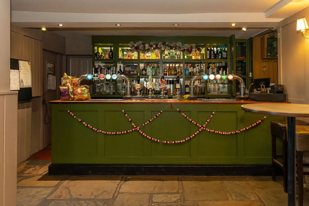 The bar at The Old Red Lion decorated for Christmas