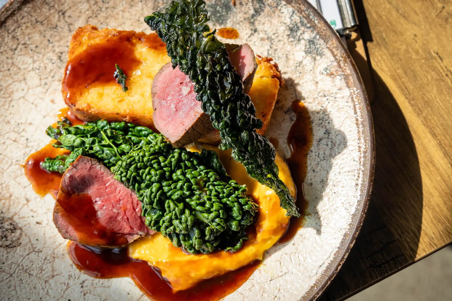 Treacle Cured Sirloin of Herefordshire Beef with Potato & Horseradish Rosti, Cavolo Nero and Squash & Nutmeg Purée, at The Old Red Lion, Horseheath