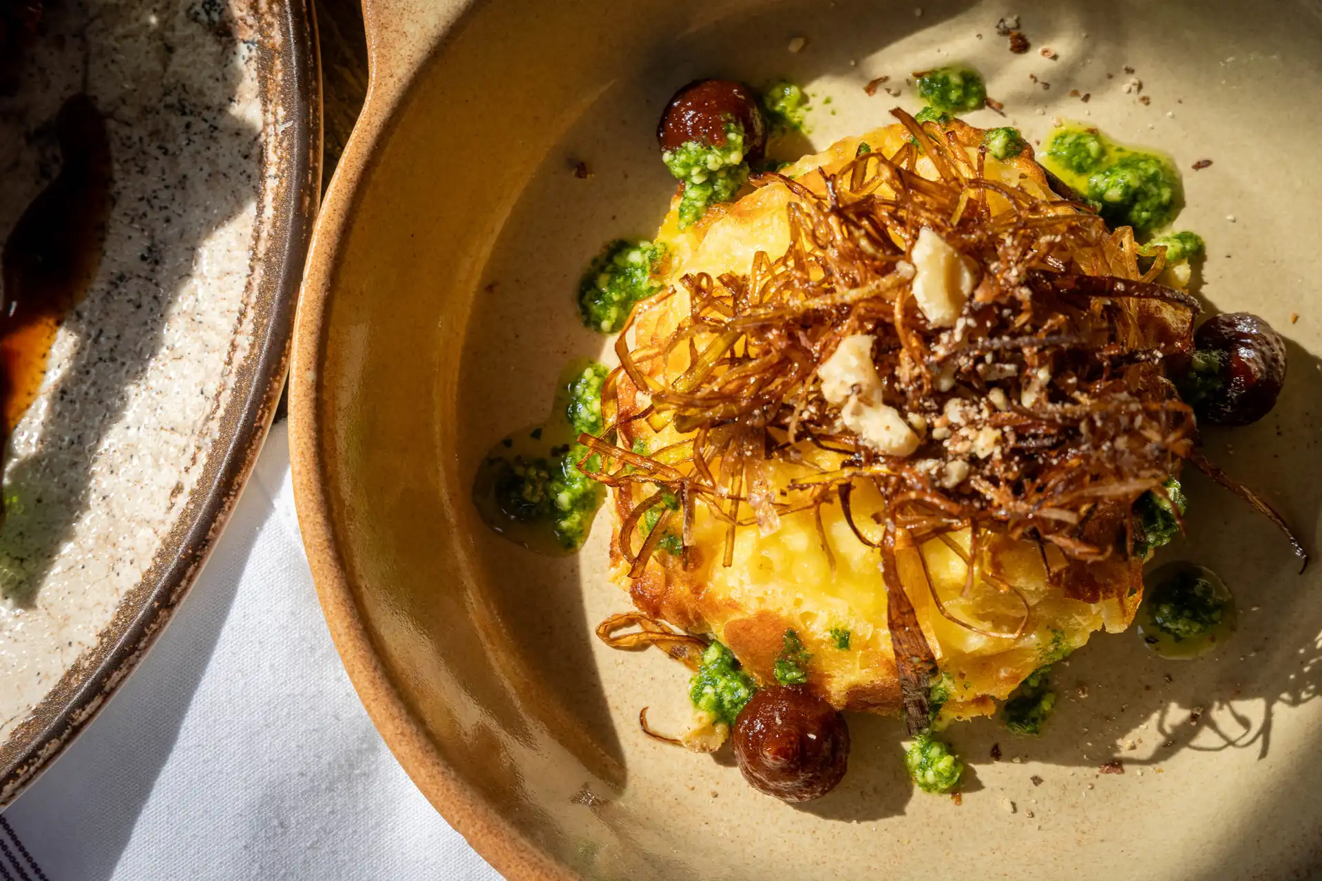 Lincolnshire Poacher Twice Baked Soufflé with Pickled Walnut Ketchup & Crispy Leeks, at The Old Red Lion, Horseheath